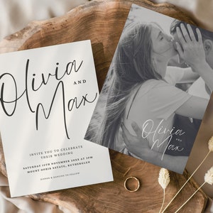 May include: A wedding invitation with a black and white photo of a couple kissing. The invitation text reads "Olivia and Max" and includes the wedding date, time, and location.