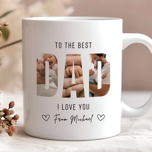 May include: White ceramic mug with a photo collage of a father and child in the word "DAD". The text "To the best Dad I love you From Michael" is printed on the mug.