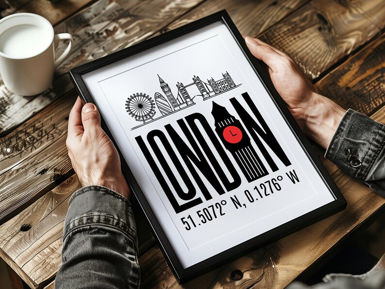 May include: A black and white framed print with a graphic design of the London skyline and the word "LONDON" in bold black letters. The Big Ben clock tower is featured prominently, with the text "51.5072&deg; N, 0.1276&deg; W" below.