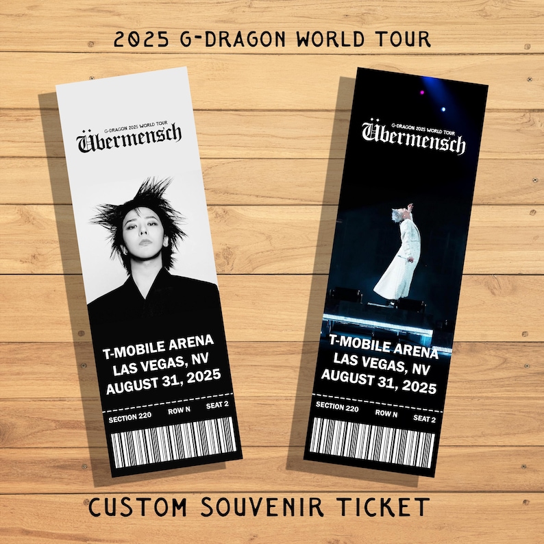 May include: Two souvenir tickets for the 2025 G-Dragon World Tour at T-Mobile Arena in Las Vegas, NV. The tickets are white and black with the text "&Uuml;bermensch" and the date August 31, 2025. The bottom of the tickets read "Custom Souvenir Ticket."