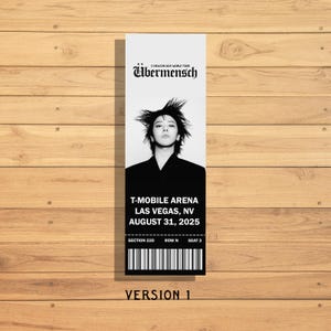May include: A black and white concert ticket for the G-Dragon 2025 World Tour. The ticket features a portrait of the artist and includes the venue, T-Mobile Arena in Las Vegas, NV, and the date, August 31, 2025. The ticket also has a barcode and reads "Version 1".