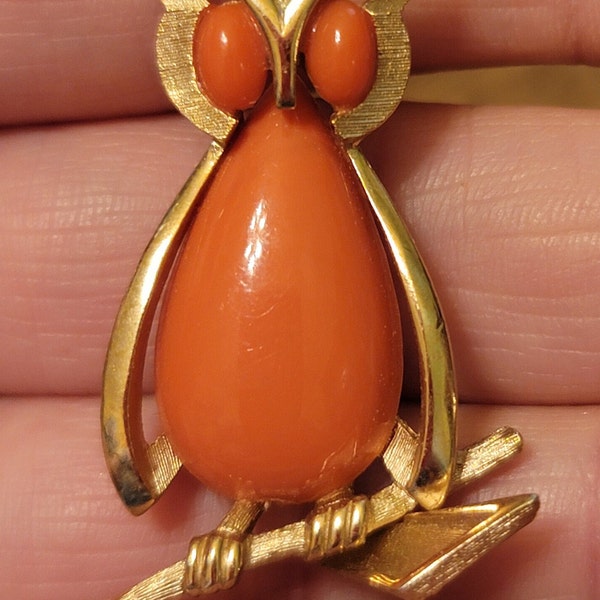 Vintage Crown Trifari 1960's Gold Owl with an orange coral cabochon brooch, pin.