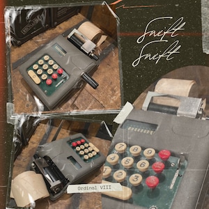 May include: Three vintage adding machines with a green and black color scheme. The machines have a paper roll, a number pad, and a display. The machines are labeled "Ordinal VIII".