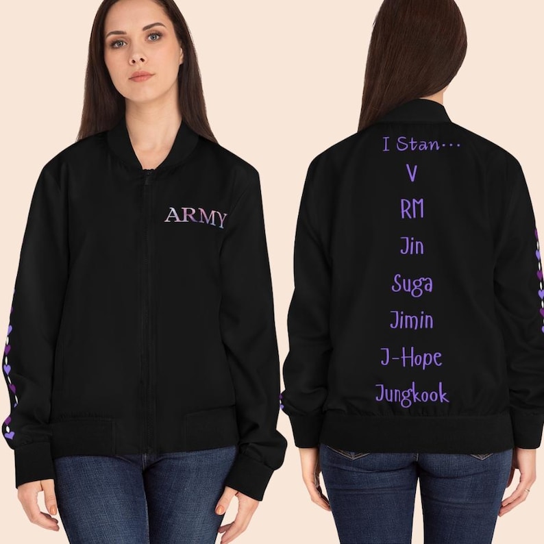 May include: Black bomber jacket with purple text that reads "ARMY" on the front and "I Stan..." followed by names on the back. The jacket has a zipper closure and purple accents on the sleeves.