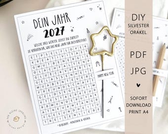 Könnte beinhalten: Ein weißes Blatt Papier mit einem Wortsuchspiel mit dem Titel DEIN JAHR 2027 und deutschen Wörtern, verziert mit kleinen schwarzen Strichzeichnungen von Partyartikeln. Ein goldener, glitzernder Tortenstecker in Sternform liegt rechts auf dem Papier.