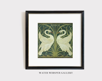 May include: A framed print of two white swans facing each other in a green and gold floral pattern. The print is titled "Water Whisper Gallery".
