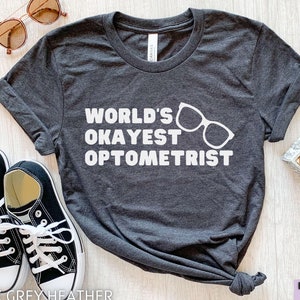 検眼医シャツ、検眼ギフト、面白い眼科医Tシャツ、検眼クリニックシャツ、アイケアTシャツ、検眼卒業生ギフト、眼鏡技師Tシャツ