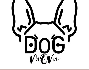 May include: Black and white line art illustration of a dog's head with the word "DOG" and the word "mom" written underneath.