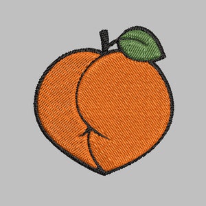May include: An embroidered peach with a green leaf. The peach is orange and has a textured surface. The leaf is green and has a textured surface.