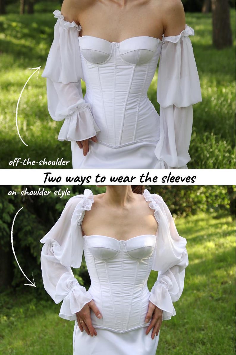 May include: A white corset-style dress with two ways to wear the sleeves. The first option is off-the-shoulder, and the second is on-shoulder style. The sleeves are sheer, with a layered design and ruffled cuffs. The dress has a sweetheart neckline and a fitted bodice.