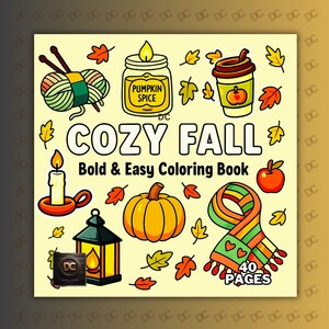 Puede incluir: Una portada de libro cuadrada ilustrada con un tema otoñal acogedor. La portada presenta una calabaza, hojas de otoño, una vela, una taza de café y el texto "COZY FALL Bold & Easy Coloring Book". También se muestra una bufanda y un tarro de especias de calabaza.