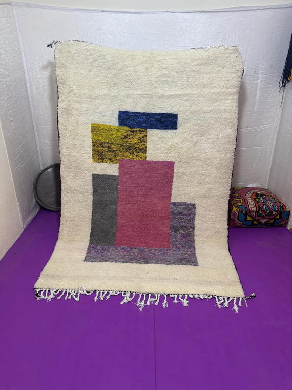 A rug with a rug... threads of grandmother's wool tell the story of the land when silence was the language of warmth.
