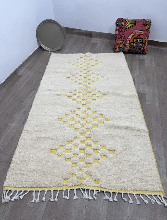 Traditional Moroccan carpet... every stitch has a story, and every color has a spirit from the depths of heritage.