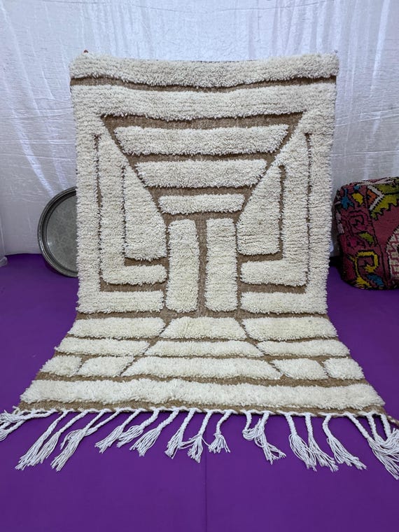 A rug with a rug... threads of grandmother's wool tell the story of the land when silence was the language of warmth.