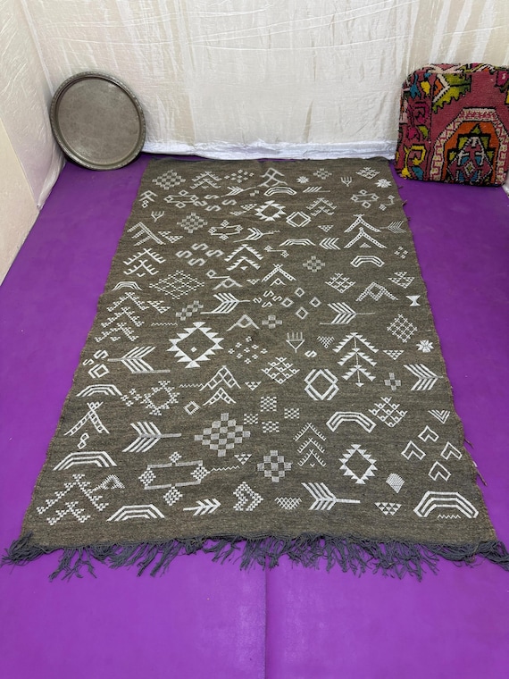 Handwoven Berber Wool Rug with Traditional Amazigh Symbols