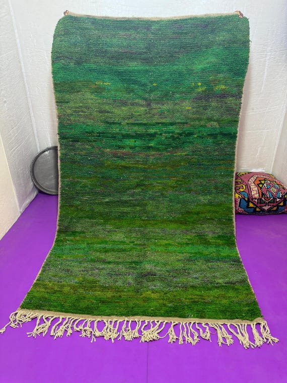A natural green Berber rug, a simple and elegant design inspired by the Atlas landscape, handwoven with pure wool threads