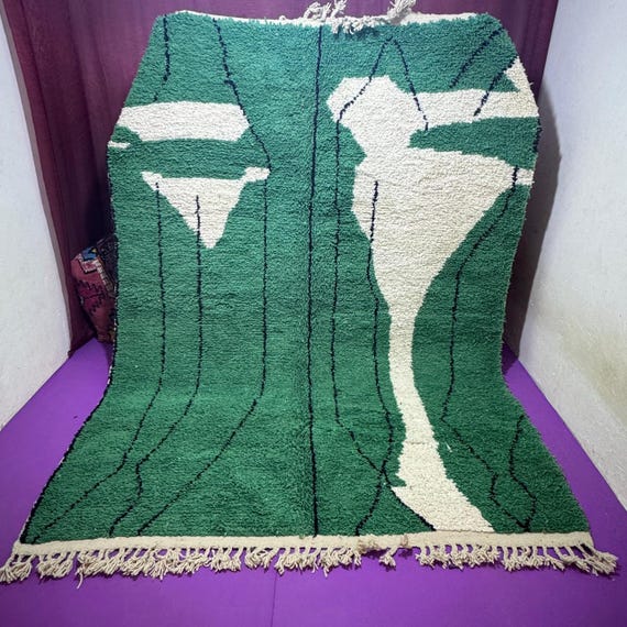 Traditional Moroccan rug decorated with geometric shapes