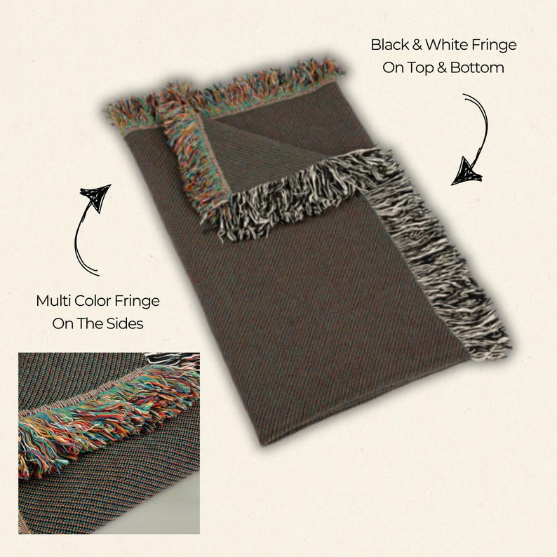 May include: A brown woven throw blanket with black and white fringe on the top and bottom and multi-colored fringe on the sides.