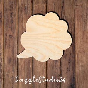 May include: A wooden cutout of a speech bubble, perfect for crafting projects. The bubble is made of unfinished wood and has a smooth surface.