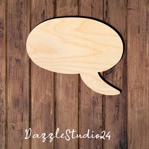 May include: A wooden speech bubble cutout, perfect for crafting projects or home decor. The bubble is light brown and has a smooth, unfinished surface.