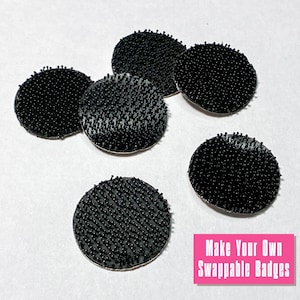 May include: Black circular hook and loop fasteners, arranged on a white surface. The image includes a pink rectangle with the text "Make Your Own Swappable Badges".