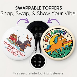 May include: A set of swappable toppers with a black base. One topper features a dachshund pulling a sleigh with the text "Dachshund Through The Snow." The other has a cartoon horse with the text "Ketamine."
