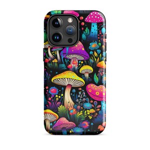 May include: A black phone case with a colourful mushroom pattern. The case displays various mushrooms in yellow, pink, purple, and red, set against a dark background with floral accents. The case is designed to fit a smartphone.