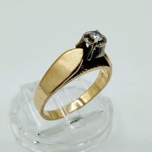 Gold solitaire ring with diamond, 0.07 ct, 17 mm