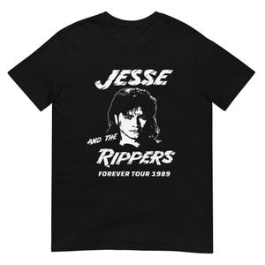 May include: Black t-shirt with a white graphic of a man with the text "Jesse and the Rippers Forever Tour 1989"