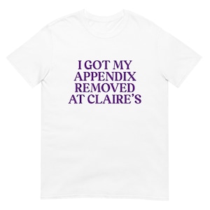 May include: White t-shirt with purple text that reads "I got my appendix removed at Claire's".