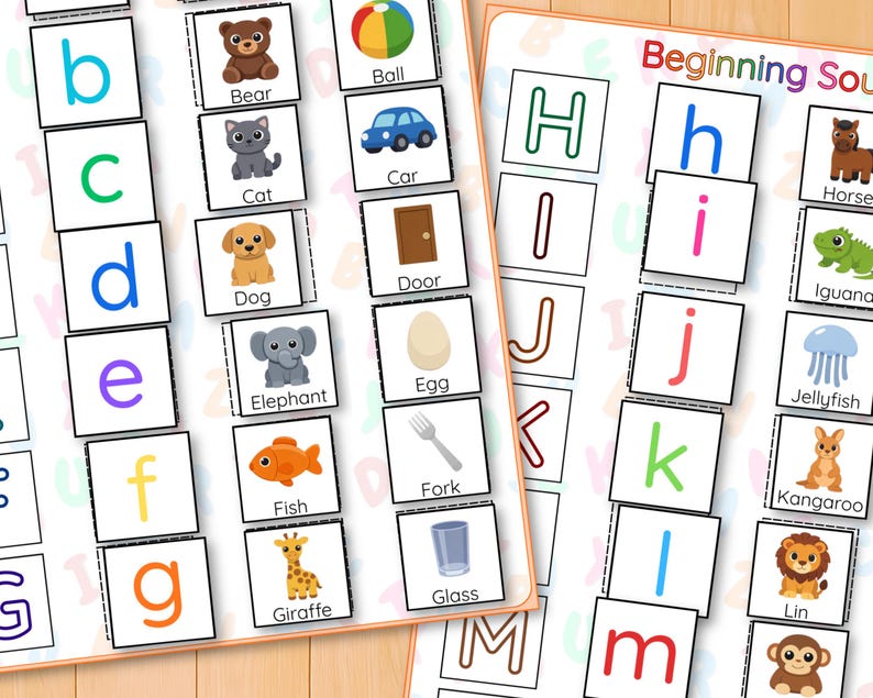 May include: Educational flashcards with the alphabet and matching images. Each card shows a letter, a picture, and the word for the image. The images include a bear, cat, dog, elephant, fish, giraffe, ball, car, door, egg, fork, and glass.