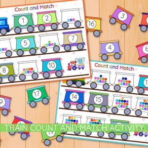 May include: Educational train-themed counting game with colorful train cars and numbers. The game features a blue train engine, train cars with numbers 1-19, and the text "Count and Match" and "TRAIN COUNT AND MATCH ACTIVITY".