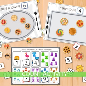 Peut inclure: Jeu éducatif de comptage avec des illustrations colorées. Comprend des cartes "Servir Brownie" et "Servir Gâteau", ainsi que des cartes de chiffres et des cartes de jeu d'association. Comporte des images de desserts et d'animaux.