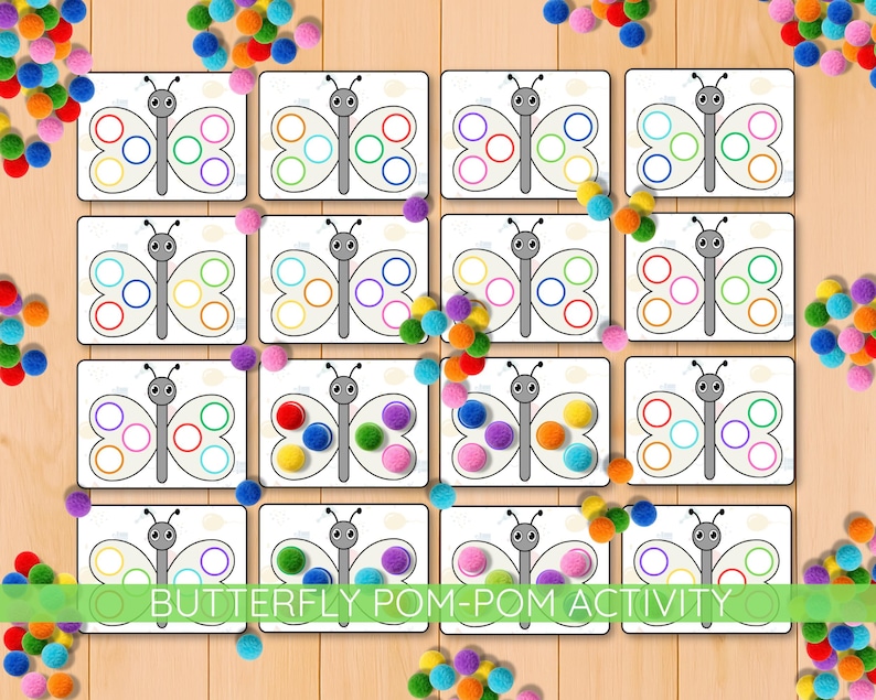 May include: Butterfly Pom-Pom Activity cards with colorful pom-poms. Each card features a butterfly outline with colored circles in the wings. The cards are designed for a matching activity, with pom-poms in various colors.