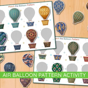 May include: Air balloon pattern activity game with colourful hot air balloon designs. The game features matching cards with various patterns and colours, including blue, gold, and red. The text "Match the Balloon Pattern" is visible on the game cards.