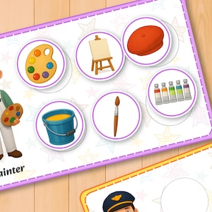 May include: A colorful educational card featuring a cartoon painter with art supplies. The card includes a paint palette, easel, beret, paint tubes, brush, and a bucket of yellow paint. The word "Painter" is written at the bottom of the card.
