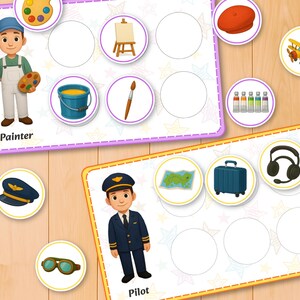 May include: Educational game featuring illustrations of a painter and a pilot. The painter holds a brush and palette, while the pilot stands next to a map and suitcase. Additional art and aviation-themed icons are included.