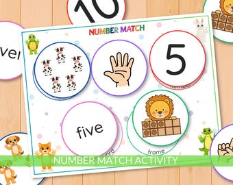 May include: A colorful educational game titled "NUMBER MATCH ACTIVITY". The game features circles with numbers, words, hand illustrations, and animal graphics. The number 5 is displayed with a lion and a frame.