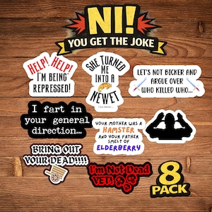 May include: A collection of humorous stickers with various phrases and graphics. The stickers include phrases like "NI! YOU GET THE JOKE," "I'm being repressed," and "Bring out your dead!!!!" The stickers are in various shapes and colors.