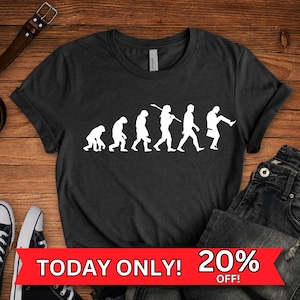 Camiseta "Monty Python Silly Walk": Camiseta gráfica "Evolución del hombre"