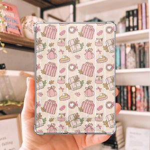 May include: A rectangular tablet case featuring a repeating pattern of pink gift boxes, small jars, and heart-shaped icons on a light beige background with vertical stripes. The case has clear protective corners and a slim, flat design.