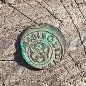 Moneda auténtica de 1648 de Livonia sueca (billón de chelines), moneda de plata y cobre, reina Cristina.