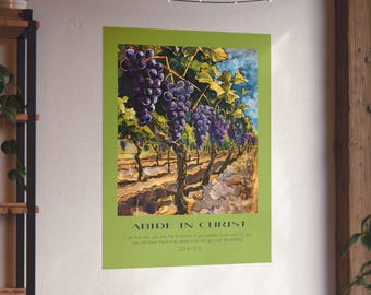 May include: A green poster with a painting of a vineyard with bunches of purple grapes hanging from the vines. The poster has the text "ABIDE IN CHRIST" and a bible verse from John 15:5.