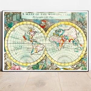 May include: Framed vintage world map featuring two hemispheres with detailed cartography. The map is in a black frame and includes text that reads "A MAPP OF THE WORLD by J. Seller, Hydrographer to the King." The map is decorated with colorful illustrations.