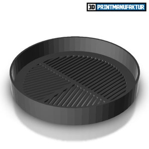 Może przedstawiać: Okrągły, czarny ruszt do grilla z podwyższonym brzegiem. Ruszt ma wzór z równoległych linii.
