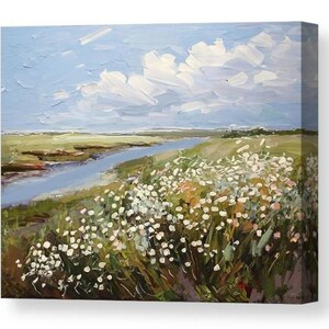 May include: An oil painting on canvas showing a tranquil landscape. A blue river meanders through green fields, beneath a sky with fluffy white clouds. White wildflowers bloom in the foreground, adding texture and contrast.