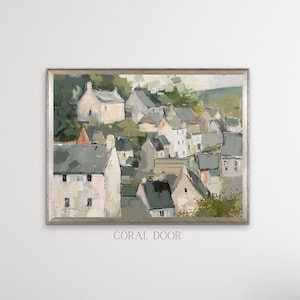 May include: A framed landscape painting depicts a village nestled on a hillside. The artwork features houses with gray roofs and white walls, set against a backdrop of green foliage. The text "CORAL DOOR" is at the bottom.