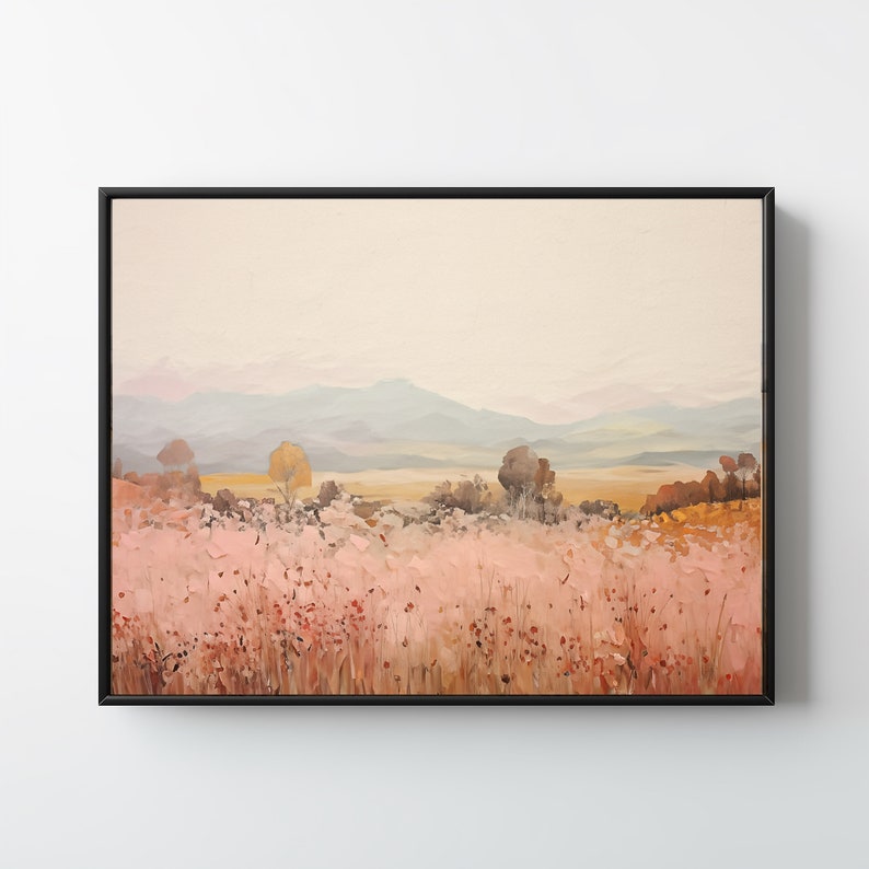 以下が含まれることがあります： 手前のピンクの野花畑、中間の木々、奥の青い山脈を描いた風景画です