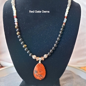 Red Obsidian gemstone pendant on obsidian and mother of pearl boho handmade statement necklace