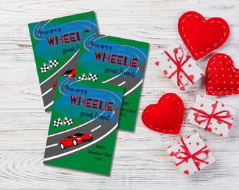 May include: Three Valentine's Day cards with a red race car and checkered flags on a green background. The cards say "You are a Wheelie great friend!" and "Happy Valentine's Day! Love."